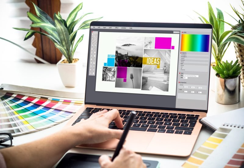 Graphic designer woman working on a laptop